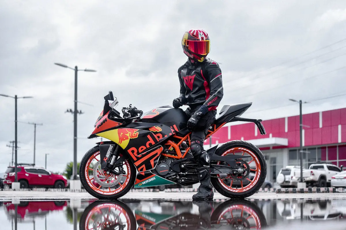 Biker in helmet on a motorcycle.