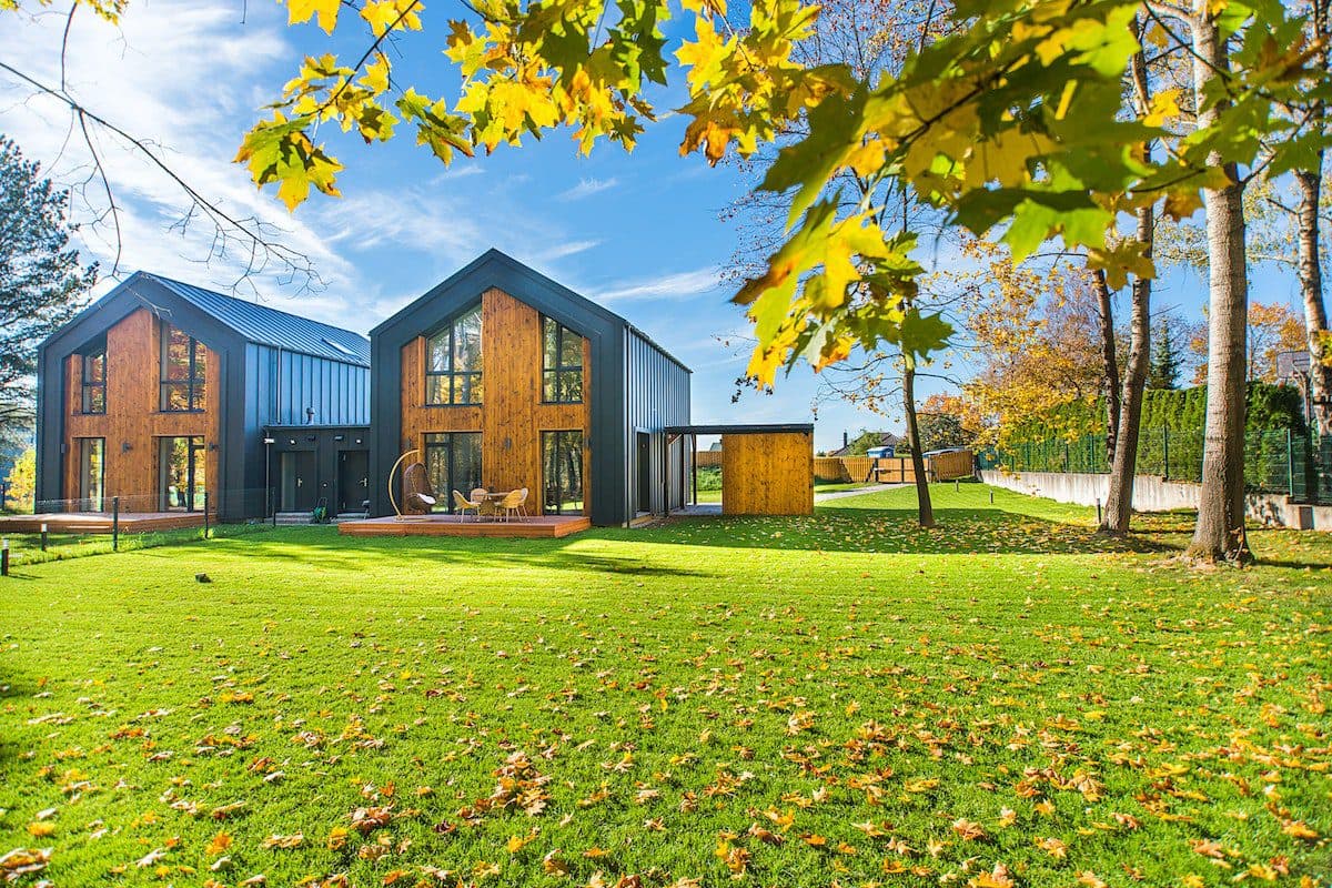 a house with a lawn and trees