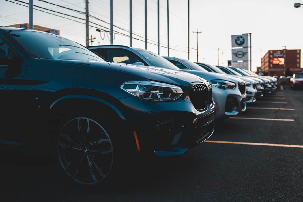 a row of cars in a parking lot