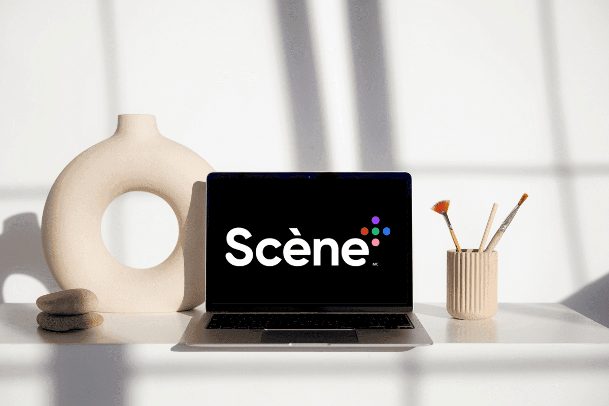 A laptop displaying the logo of Scene, representing a captivating visual identity for the brand.