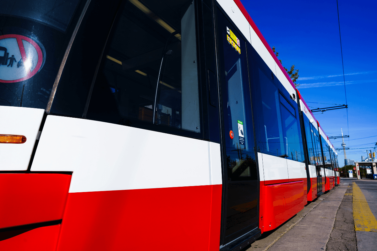 a red and white transit train