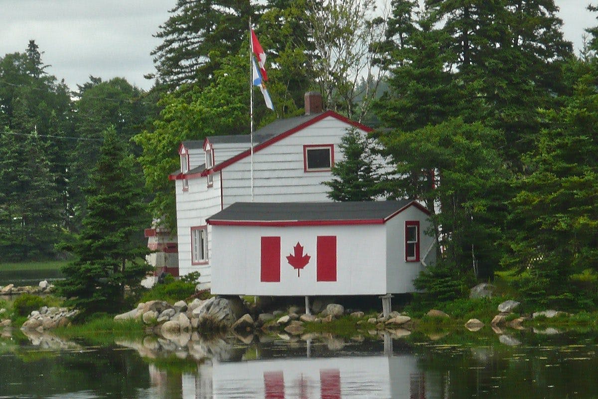 a house with a flag on the front of it