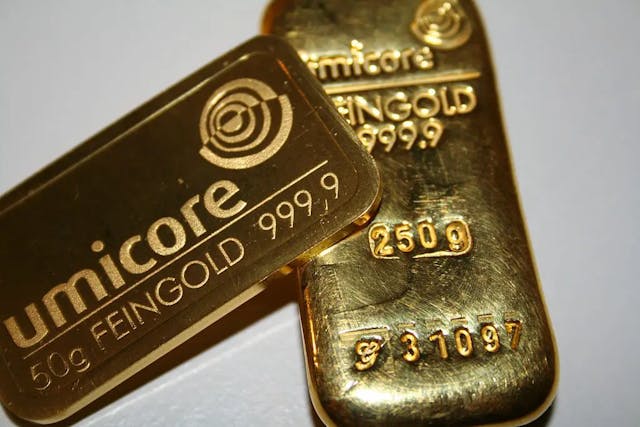 a close up of two gold bars