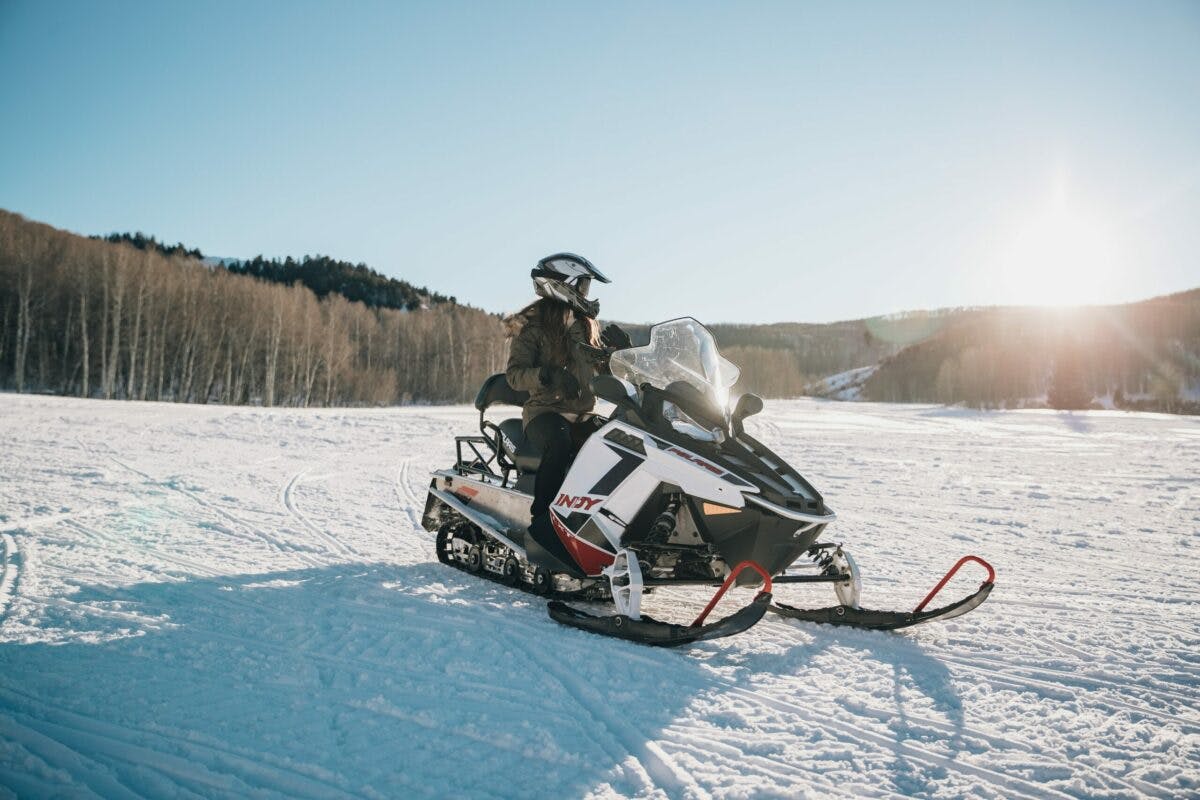 a person on a snowmobile