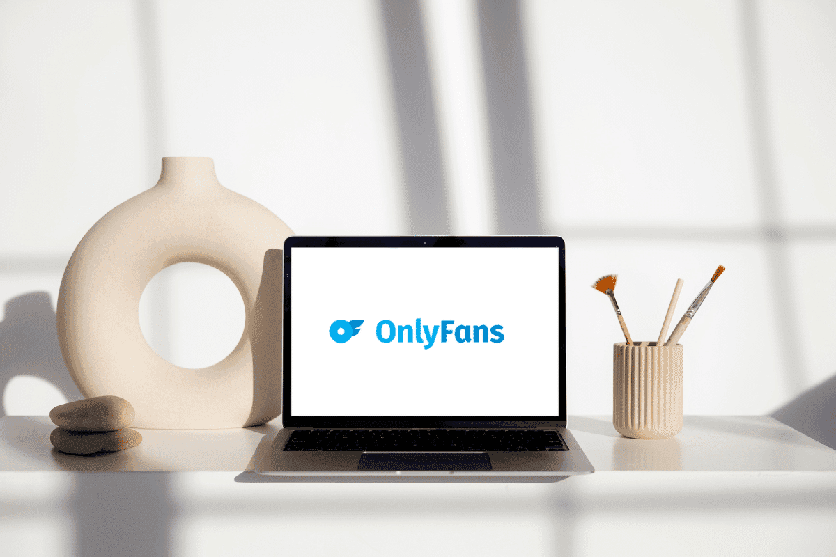 A laptop displaying the distinctive logo of OnlyFans, a popular online platform, known for its diverse content and subscription-based model