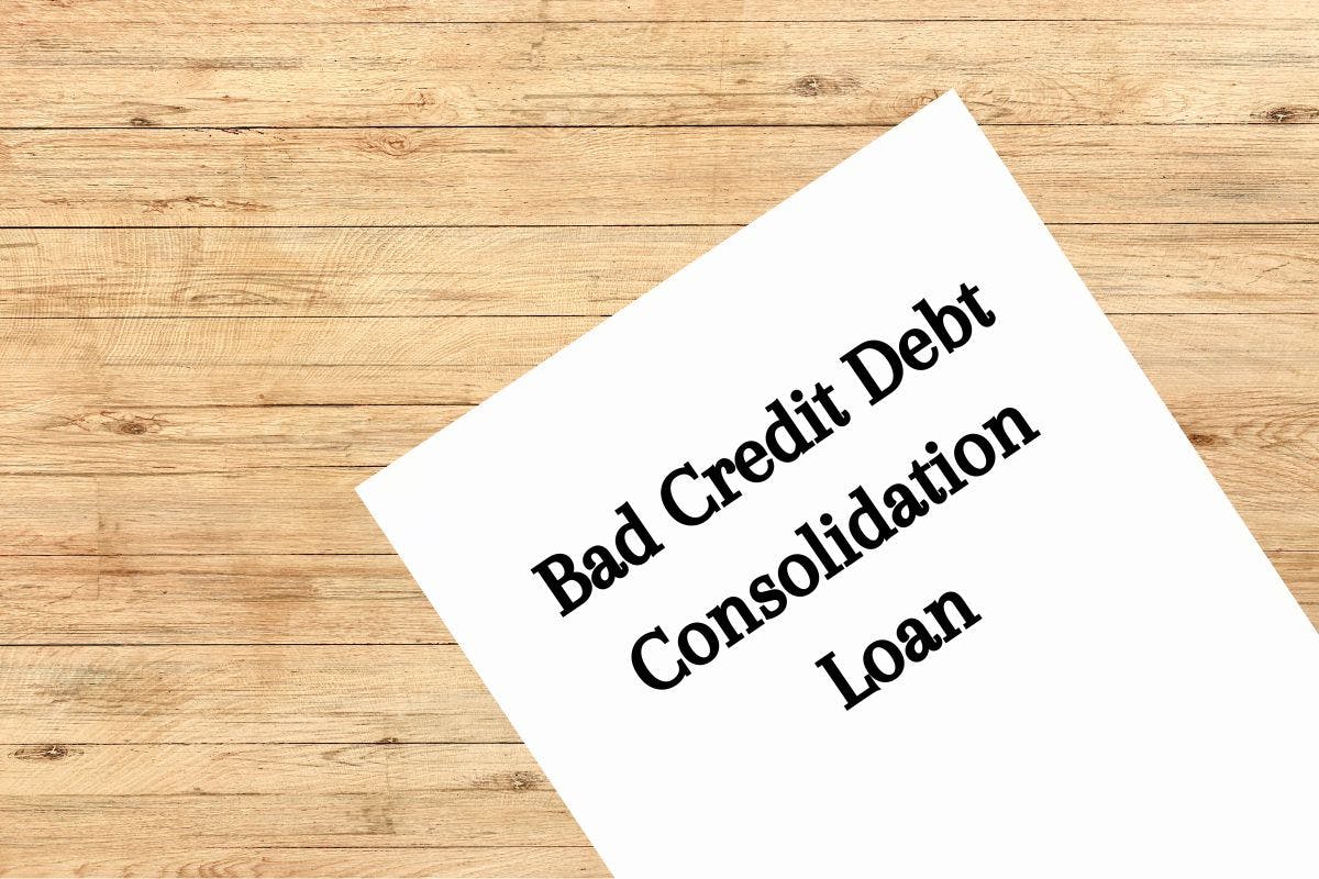 Bad Credit Debt Consolidation loan written on paper on a table