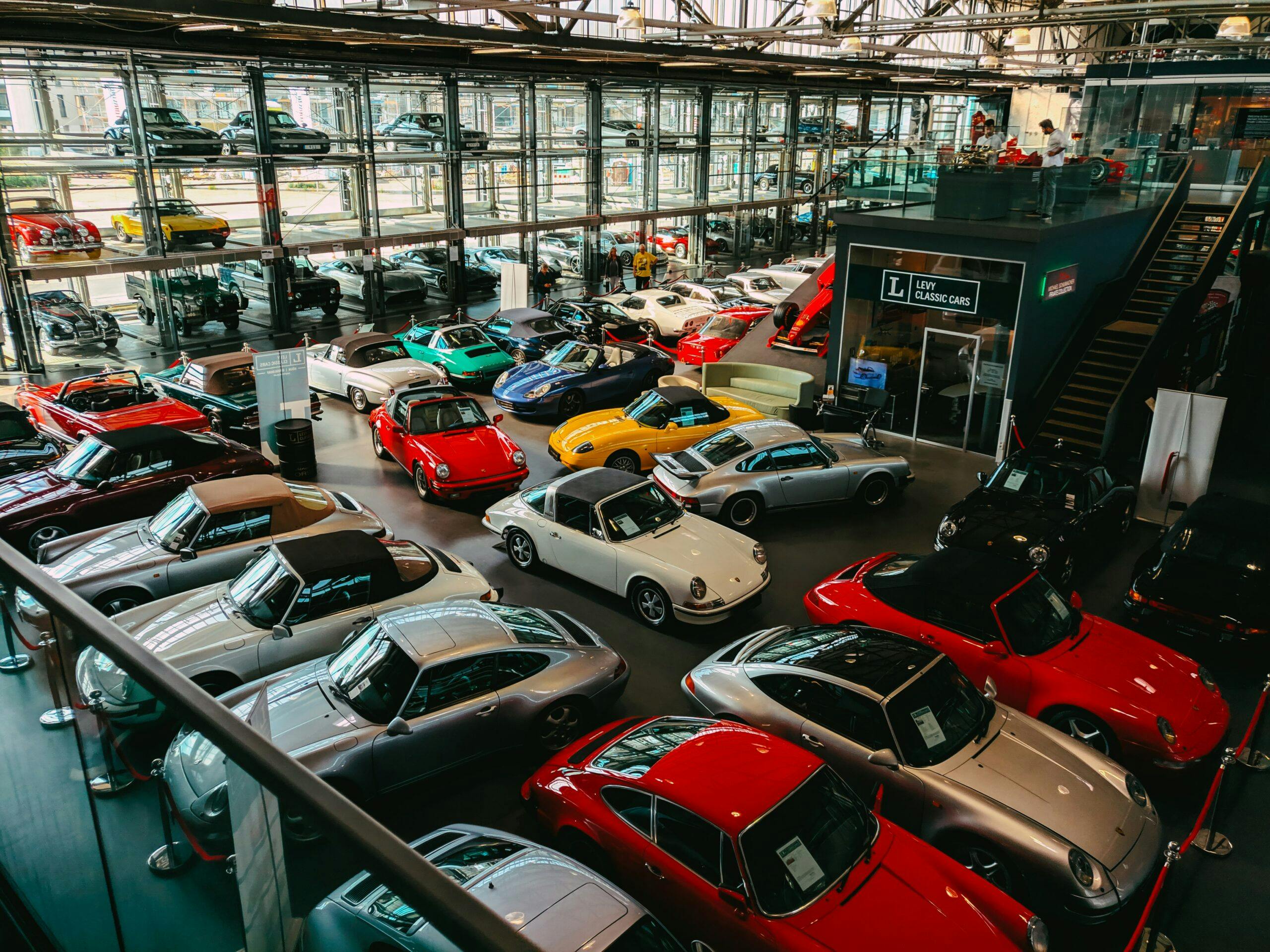 a large showroom of cars