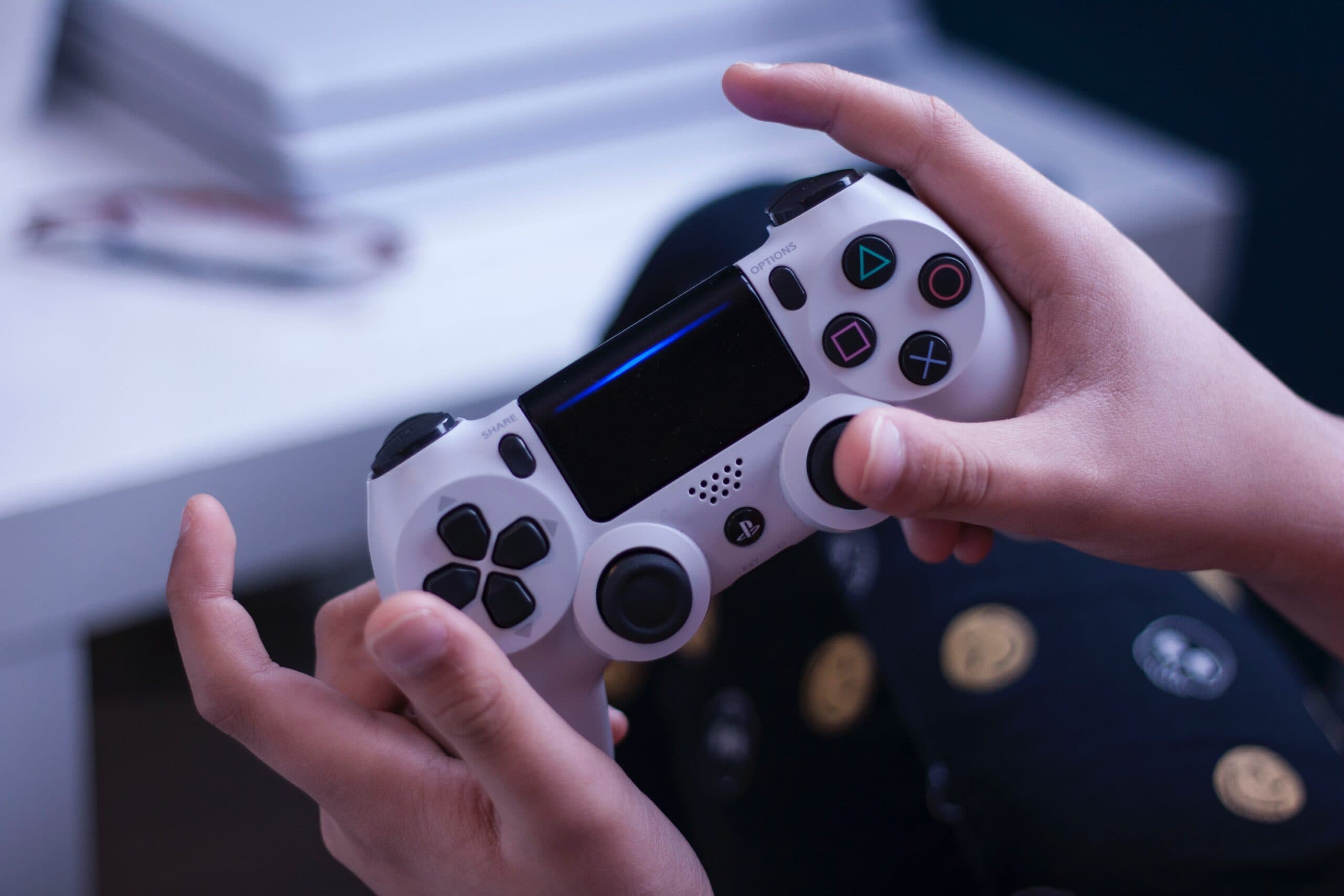 a person holding a video game controller