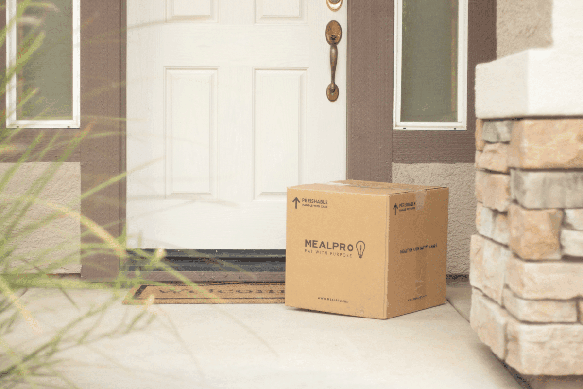 a box on the porch of a house