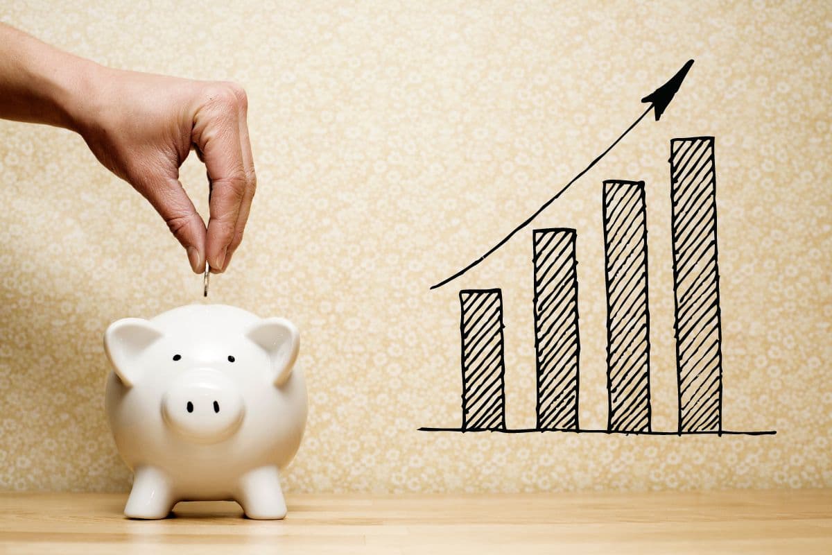 Financial planning with piggy bank and graph.