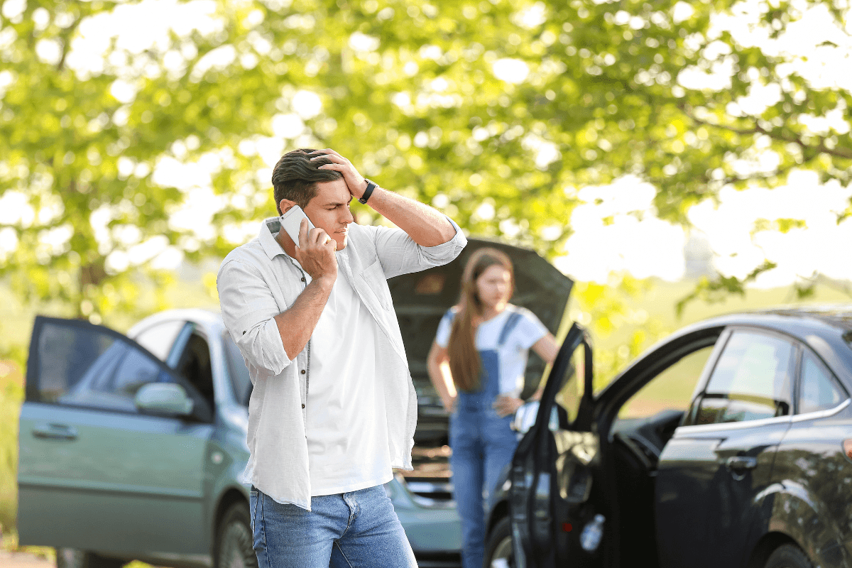 a person talking on a cell phone in a frustating situation