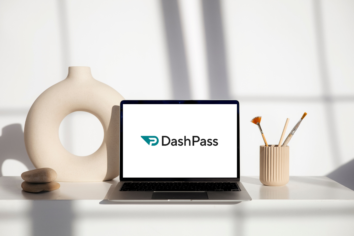 a laptop on a desk and to get free dashpass