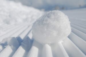 a snowball on a snowboard